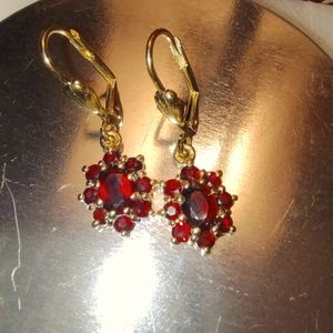Nklaus pair of 9mm garnet brisur earrings 333 in 8 k yellow gold.